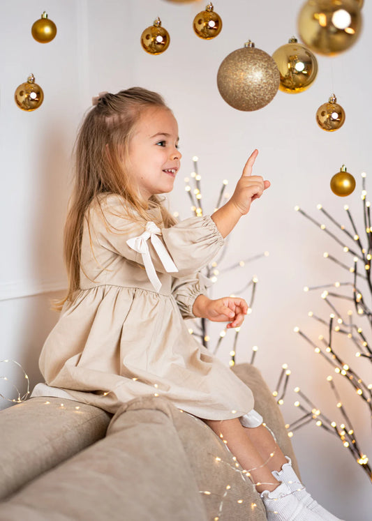 Rochita bej cu fundite pentru fetite