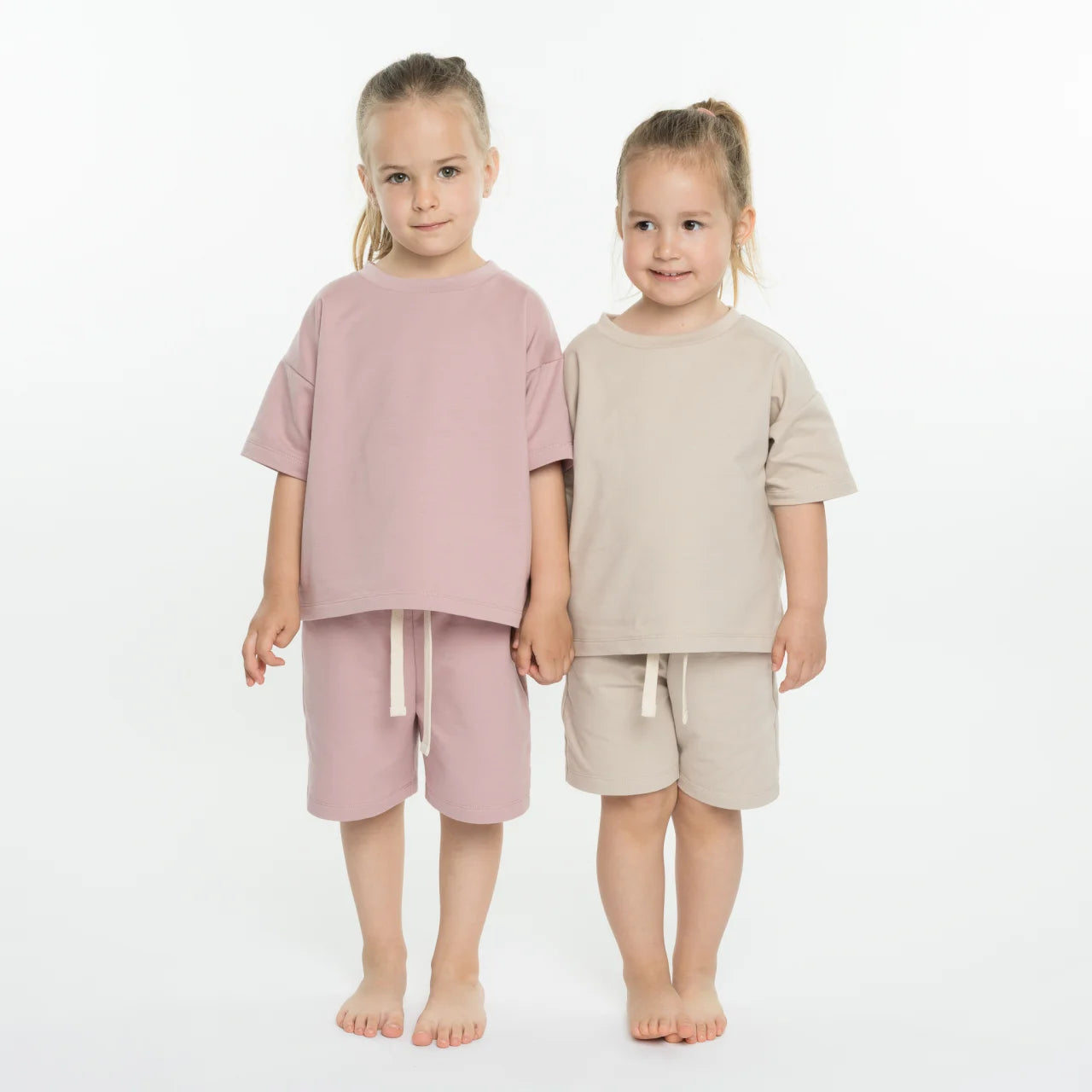 Set oversize tricou si pantaloni scurti roz din bumbac